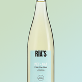 Bottle of Ria's Pet-Nat wine on a light green background