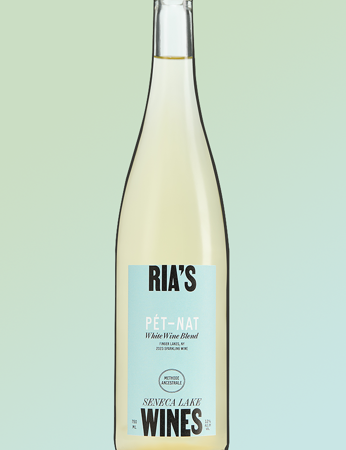 Bottle of Ria's Pet-Nat wine on a light green background