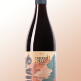 Wine bottle with a colorful label on a gradient background
