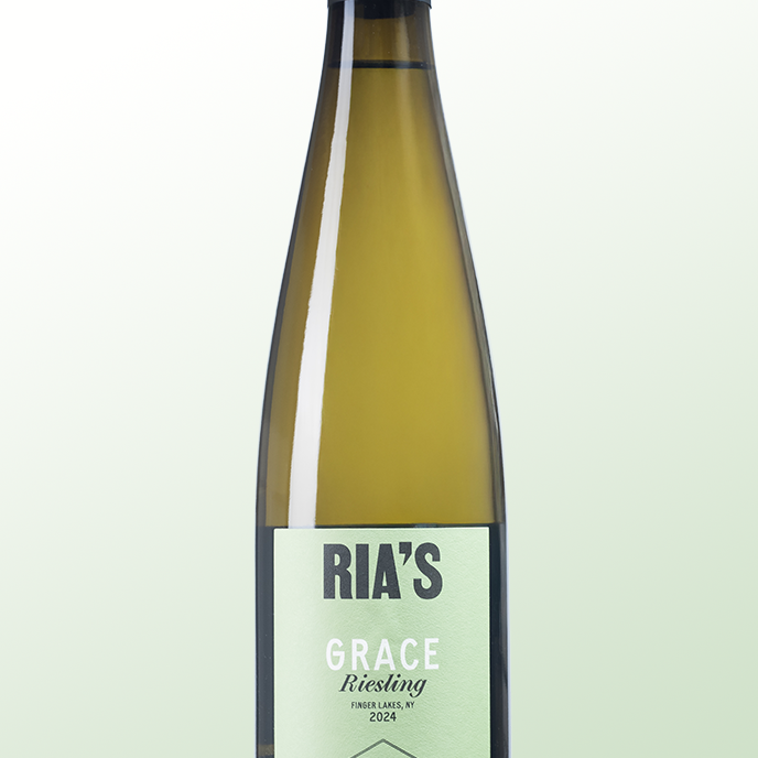 Wine bottle labeled 'Ria's Grace Riesling' on a light green background