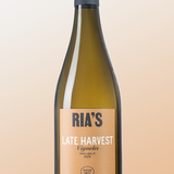 Wine bottle with 'Ria's Late Harvest' label on a gradient background